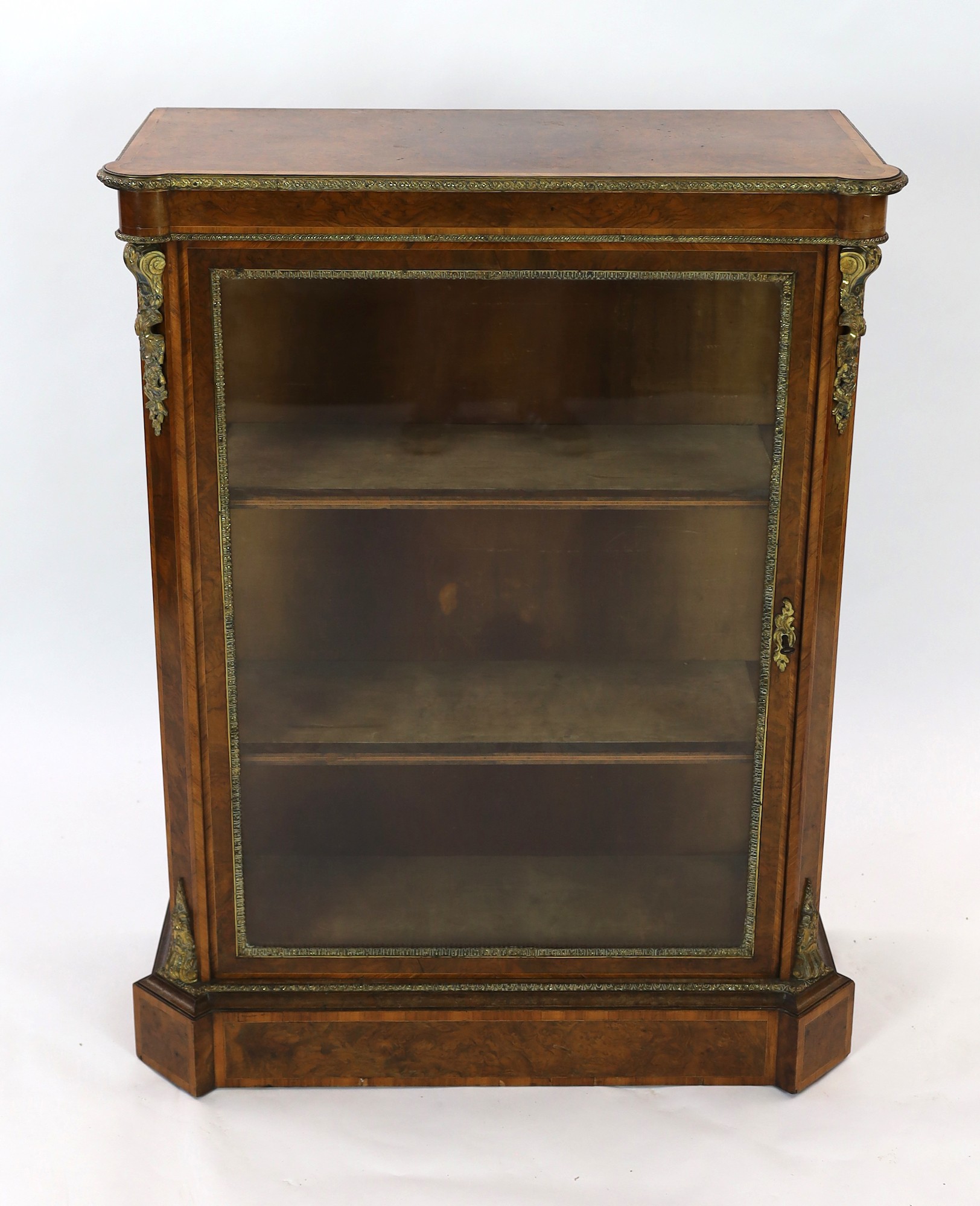 A 19th century French ormolu mounted figured walnut pier cabinet, width 90cm depth 40cm height 114cm